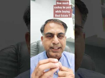 How much cash may be paid while buying Real Estate ?